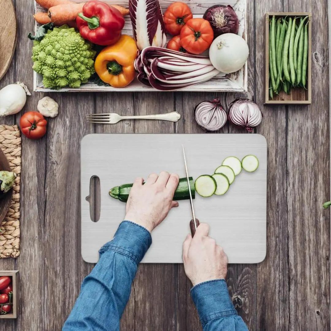 Titanium-Coated Cutting Board with Non-Porous Surface and Grip Base