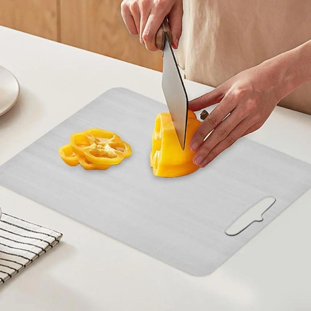 Titanium-Coated Cutting Board with Non-Porous Surface and Grip Base