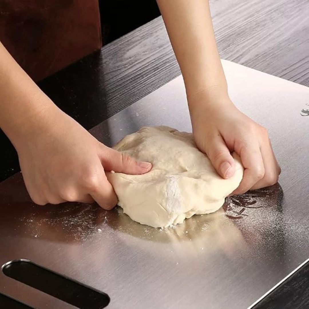 Titanium-Coated Cutting Board with Non-Porous Surface and Grip Base