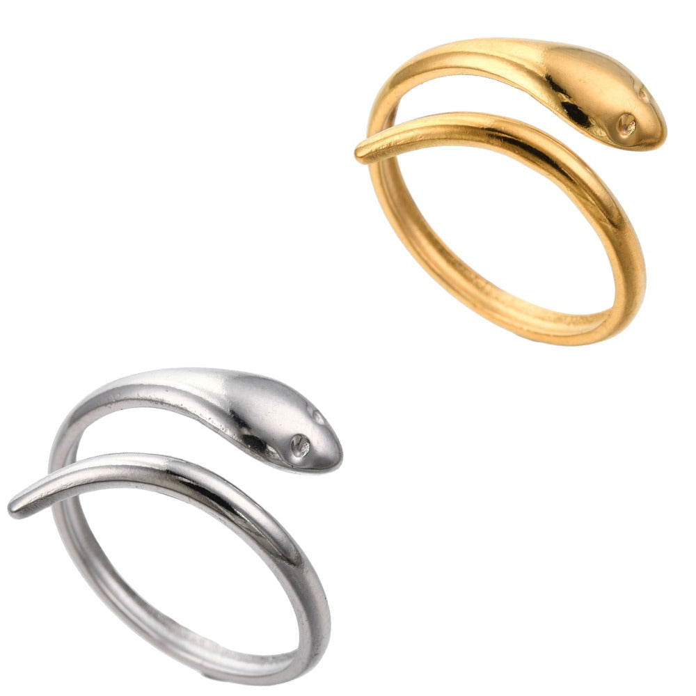 Gold and Silver Dainty Snake Wrap Ring staged on an all white surface
