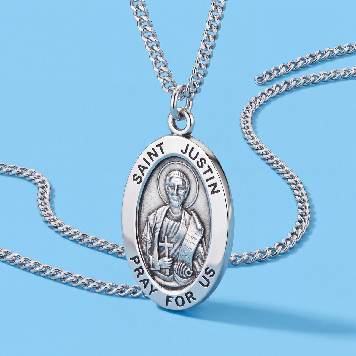 Oval Sterling Silver Medal Pendant with Saint Justin Engraving and 20 Inch Chain
