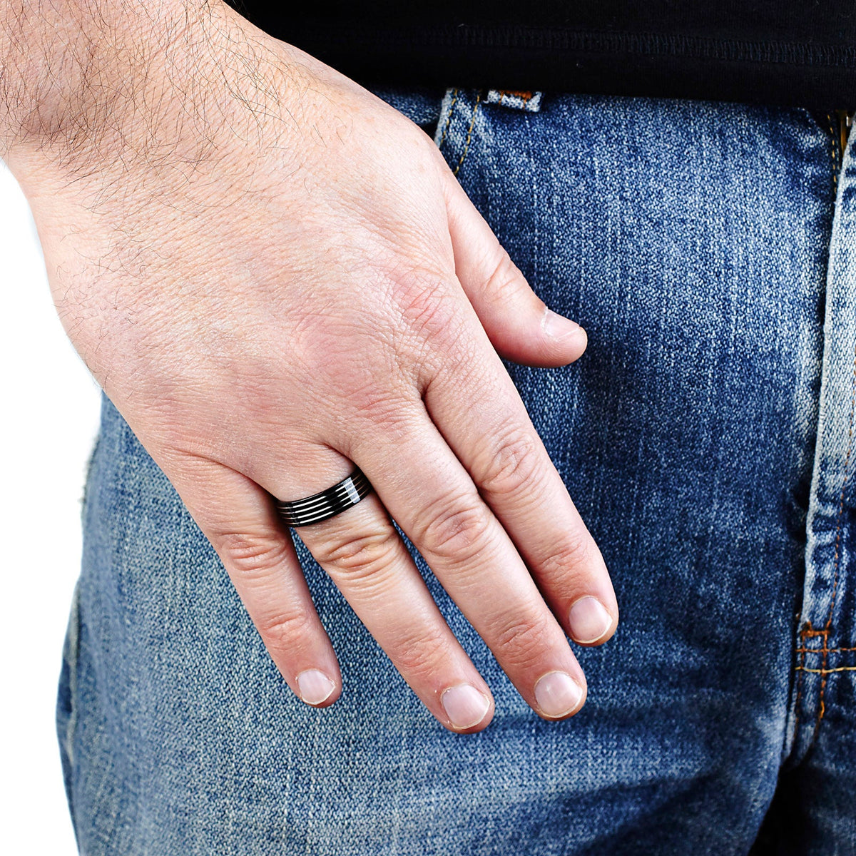Stainless steel ring with black plated grooved stripes