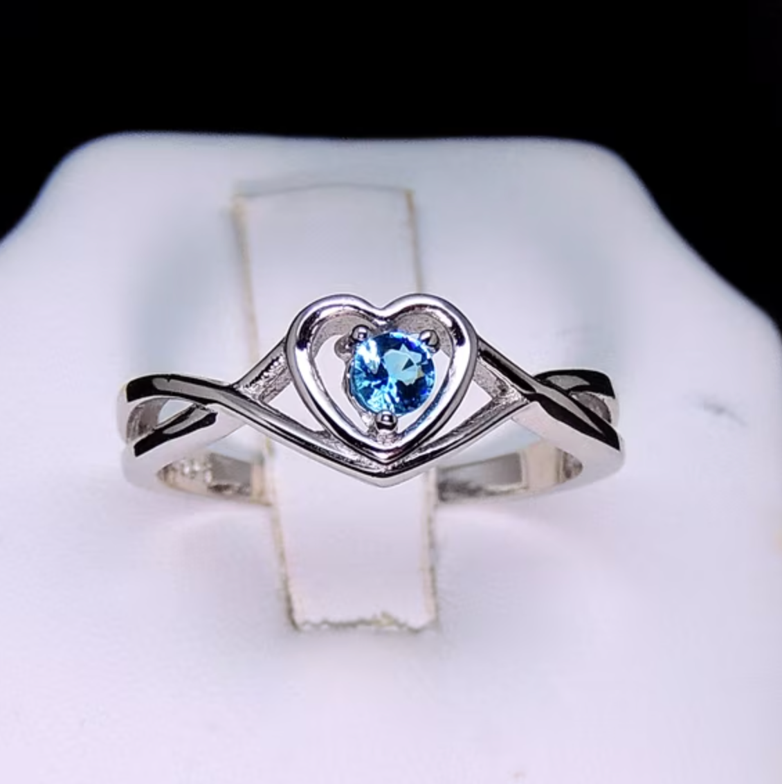Heart-Shaped Cubic Zirconia Ring with Light Blue Stone and Three-Prong Setting