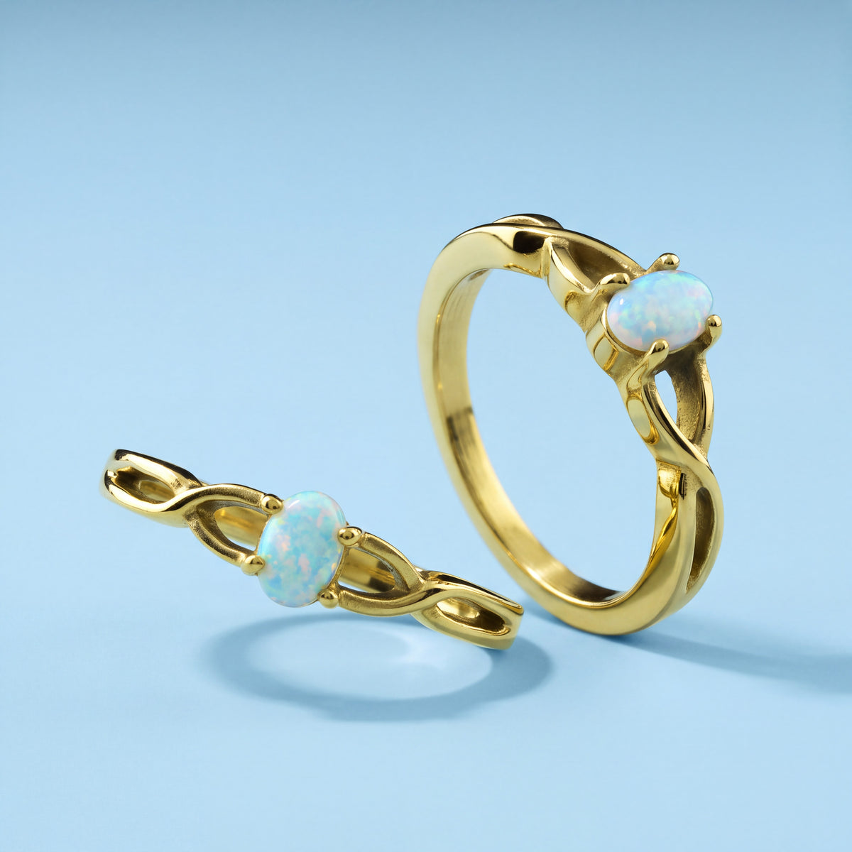 Braided Oval White Opal Ring in Gold Stainless Steel