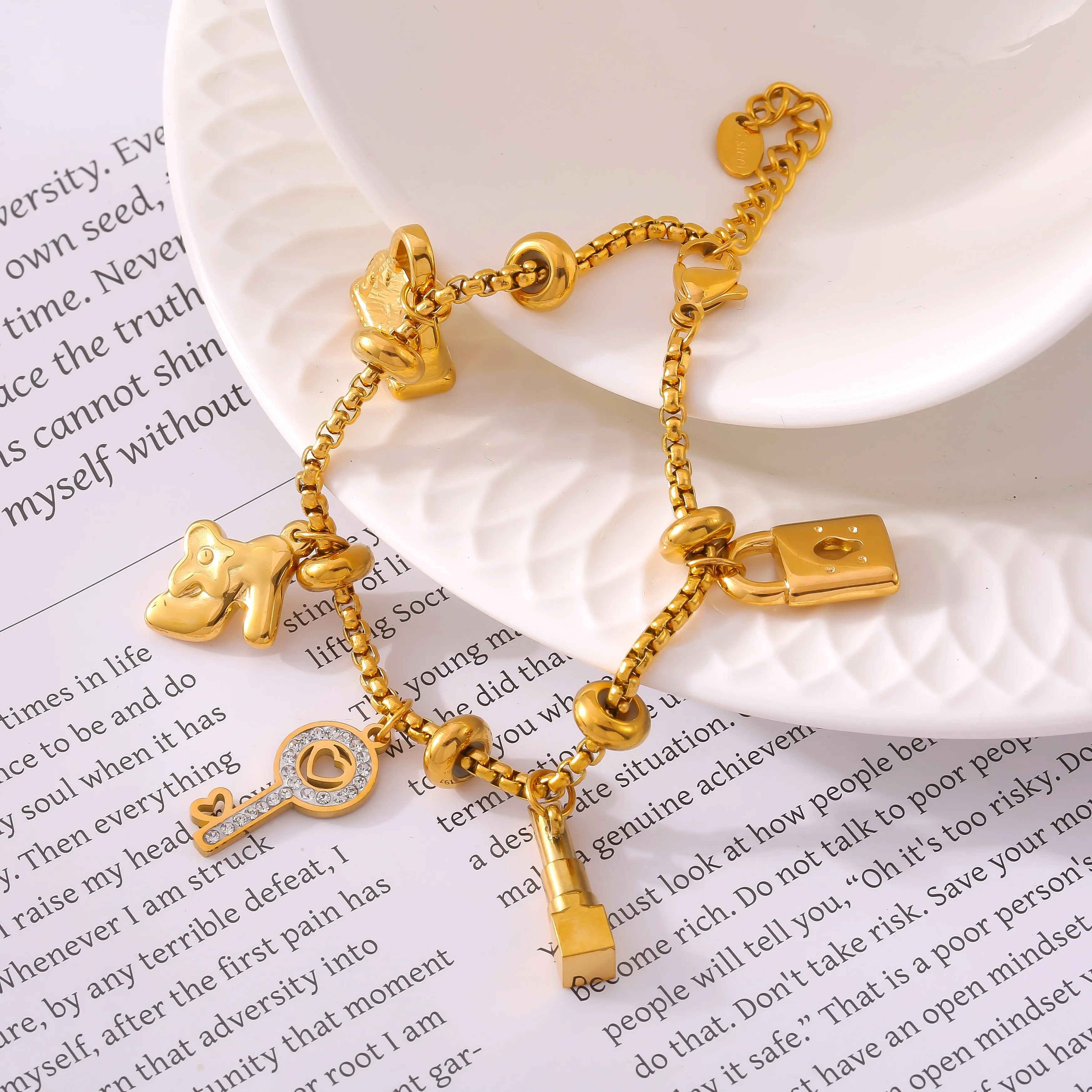 Charm Bracelet with Gold Plated Charms and Adjustable Stainless Steel Chain