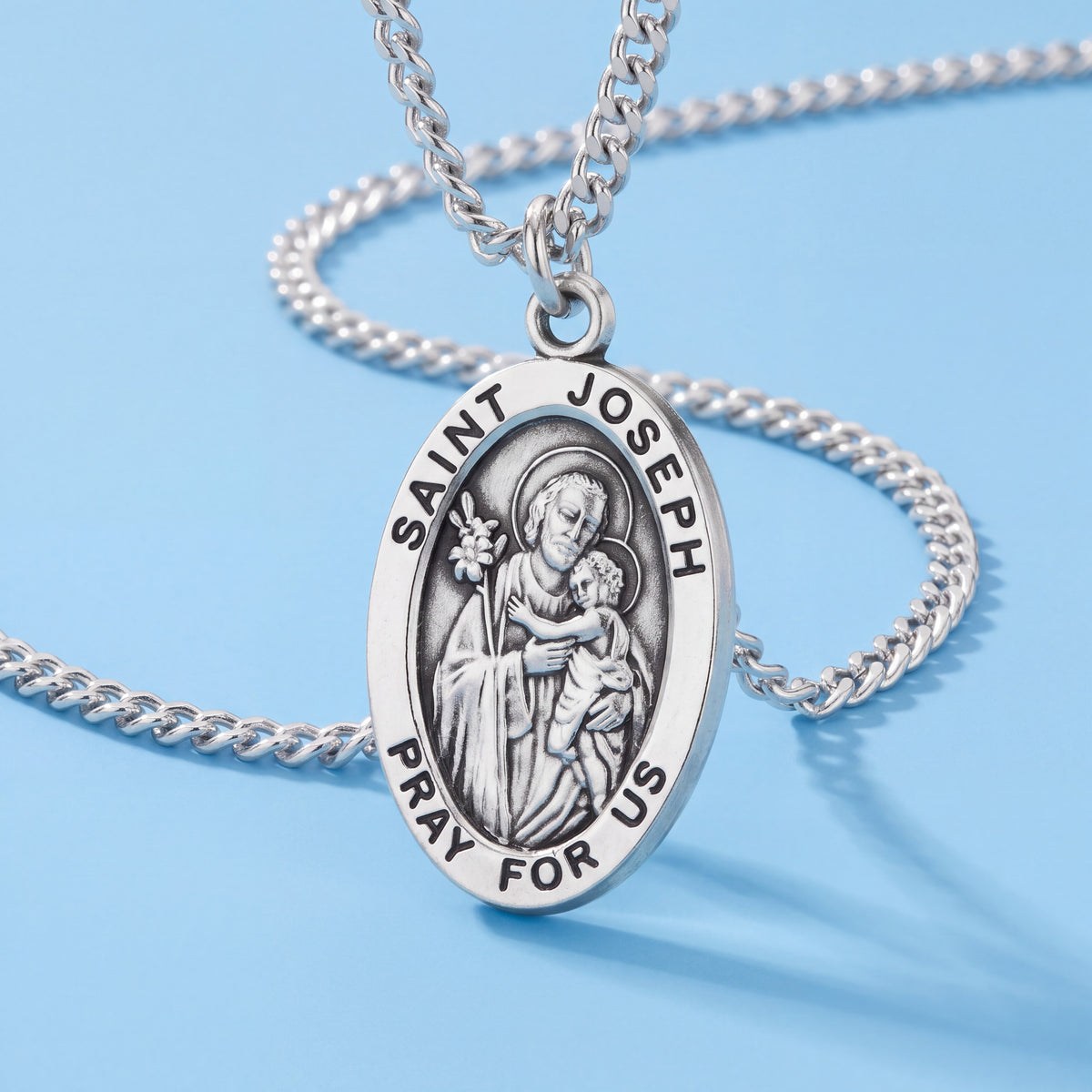 Oval Sterling Silver Medal Pendant with Saint Joseph Imagery and 20 Inch Chain