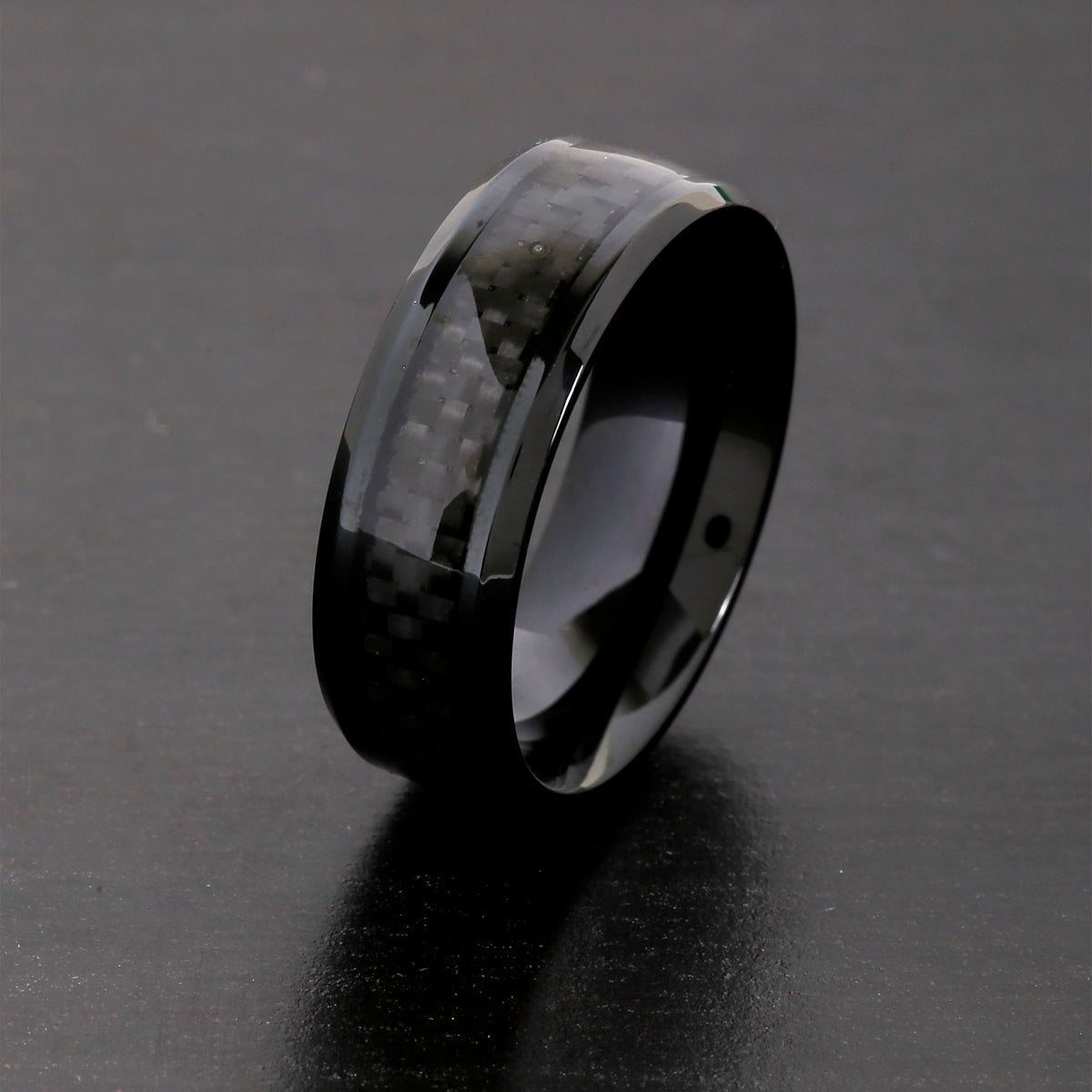 Black plated steel band ring with textured inlay